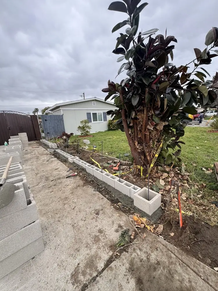 Retaining wall installation in progress
